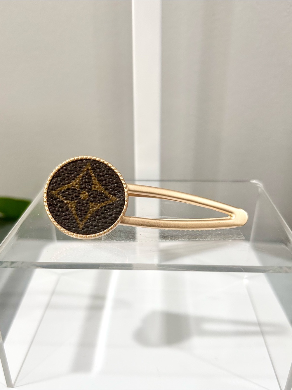 Gold-Tone Hair Clip with Brown Monogram Disc